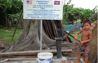 Jim & Kyra Parkhurst with Jake & Nick Parkhurst (USA). April 2012. (Trapang Thom village)